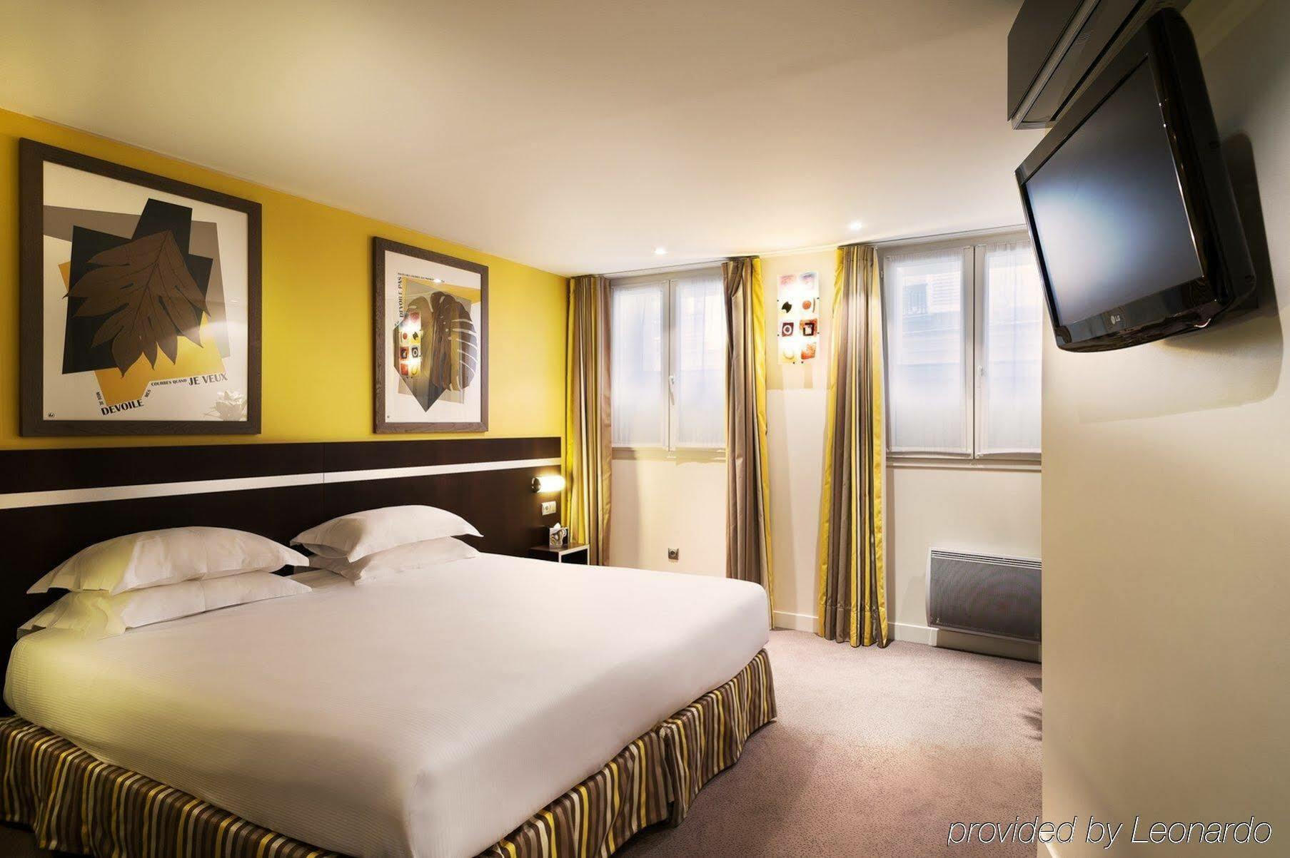 Hotel Arc De Triomphe Parigi Esterno foto